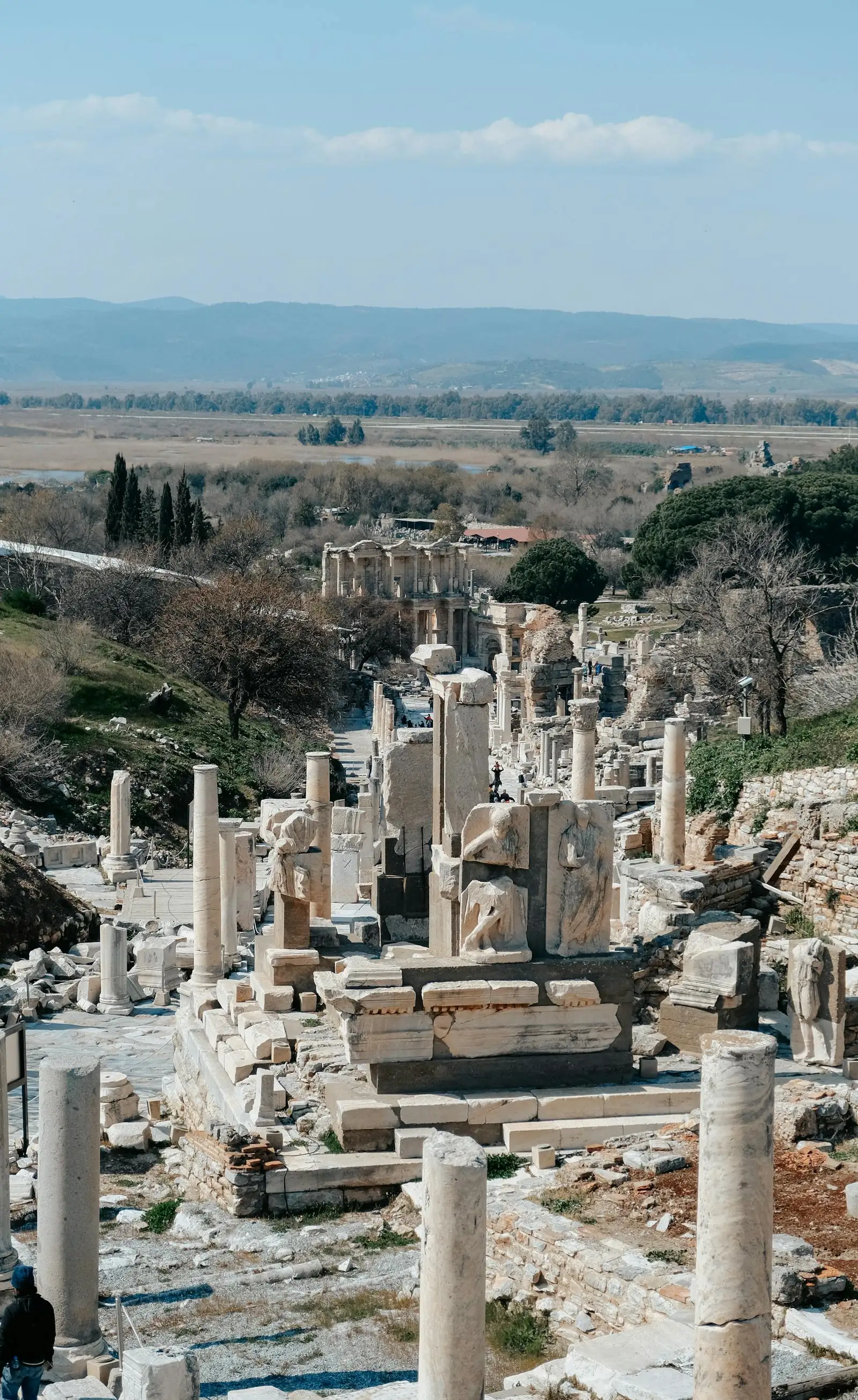 Panoramic view through ancient Ephesus ruins toward the Library of Celsus